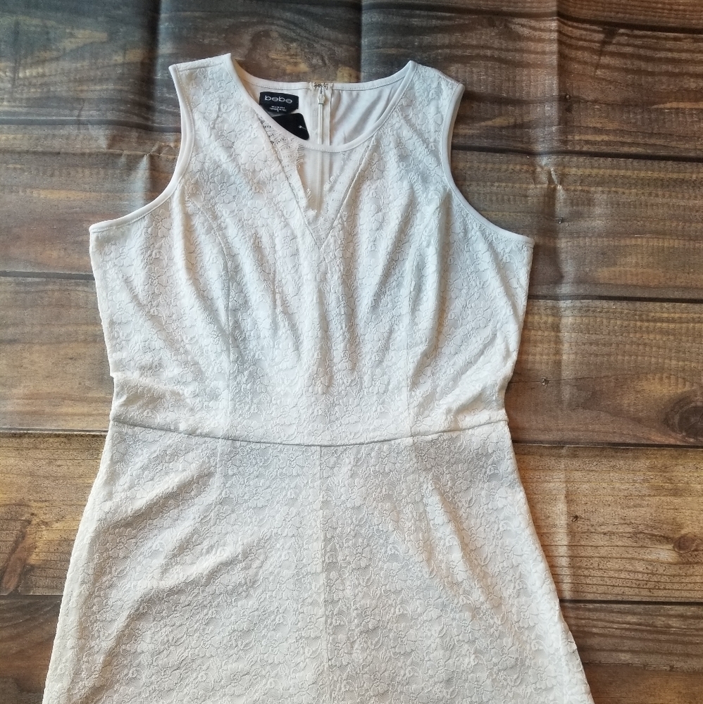 New with tag Bebe White Romper size 12